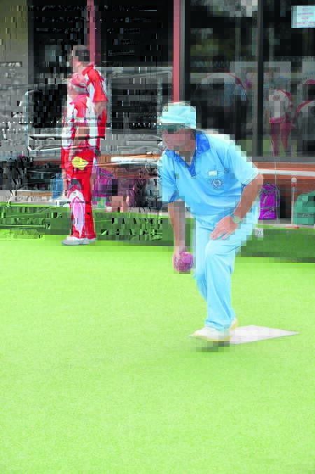 FOCUSED: Singleton Bowling Club’s Chris Wilkes has an eye on the prize during the annual Anzac Shield on Saturday.