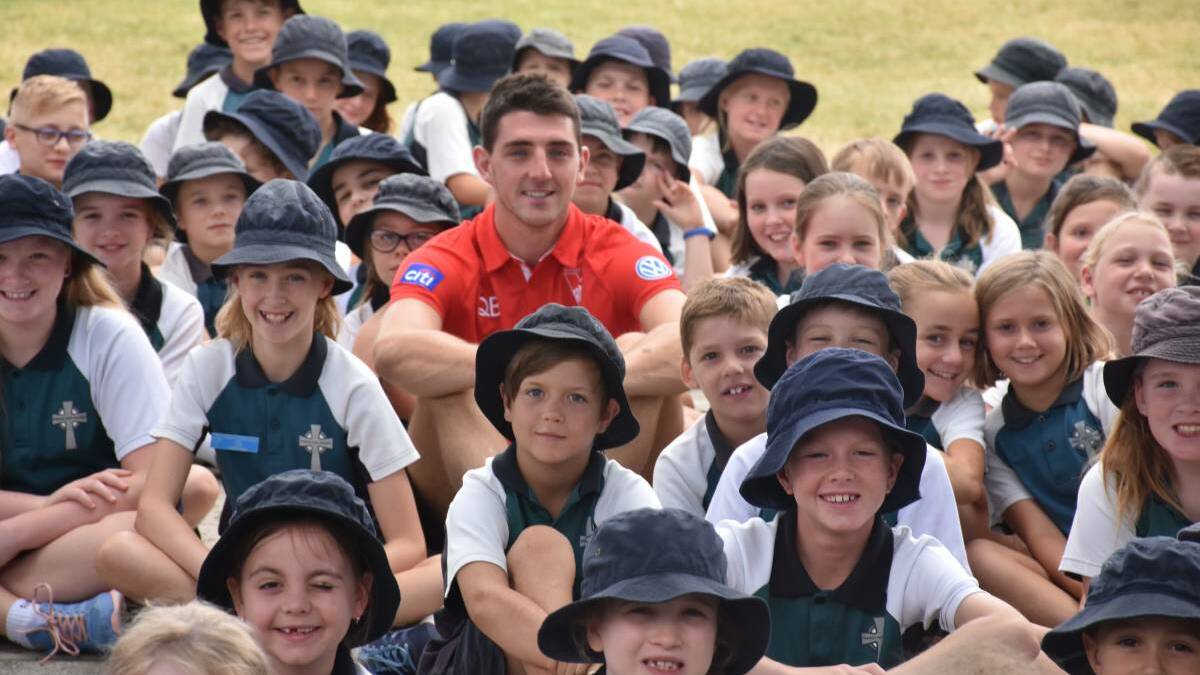 Sydney Swans Colin O'Riordan and Harry Cunningham visited Singleton in February this year as part of the 2019 AFL community camp initiative.