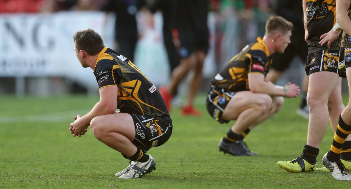 DEFEATED: Cessnock players were left disappointed after their side suffered a 36-0 Newcastle Rugby League grand final defeat to the Western Suburbs on Sunday afternoon. (Photo courtesy of the Newcastle Herald)