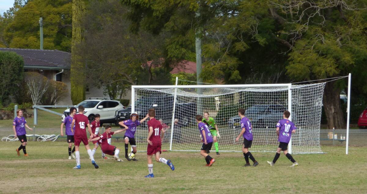 SOUTHERN END: The Singleton Strikers attempt a late goal.