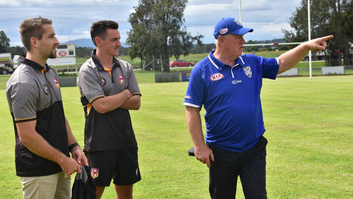 THE MENTOR: Mark Hughes shares some words with Singleton's rising star duo.