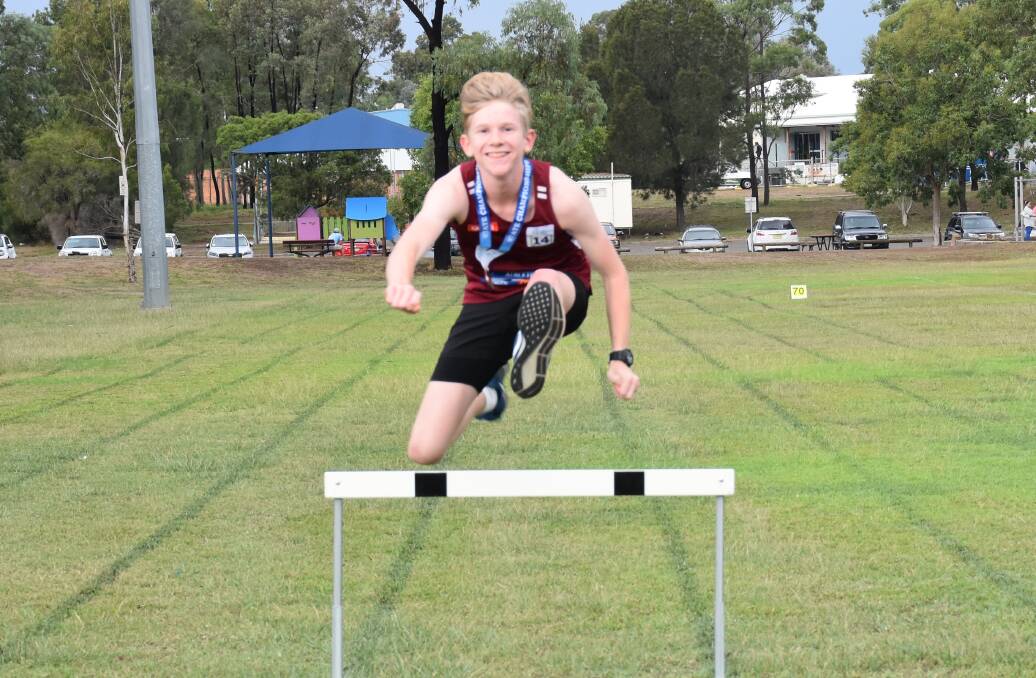 WELCOME HOME JORDIE: Singleton teenager Jordie Brown returns from Sydney's Little Athletics NSW State Championships with his bronze medal.