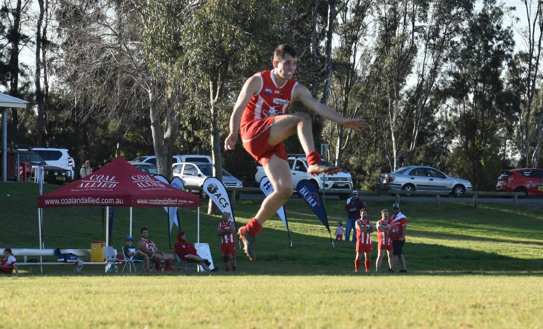 FLYING HIGH: Mitchell Gaffney pictured in action for Singleton this afternoon.