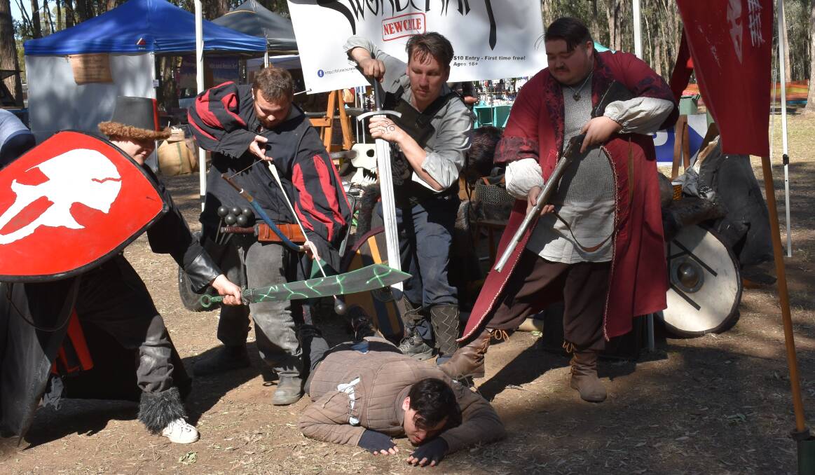 LIVE ACTION: There were plenty of demonstrations from medieval performers Swordcraft who had made the journey from Waratah. 