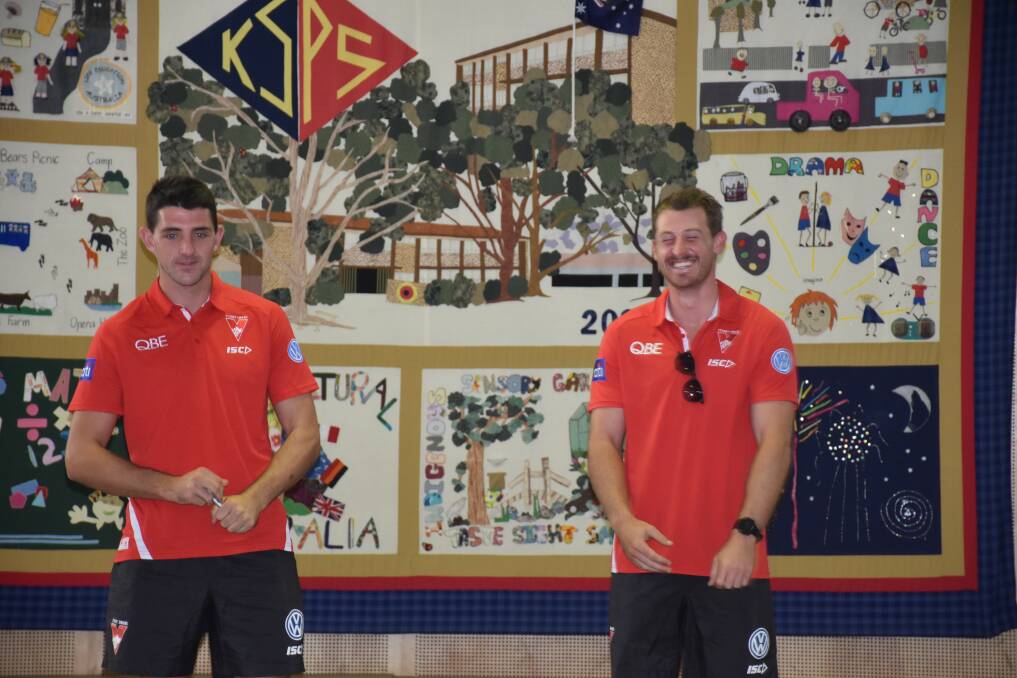 FROM THE ARCHIVES: Sydney Swans Colin O'Riordan and Harry Cunningham pictured at Singleton's King Street Public School in February.