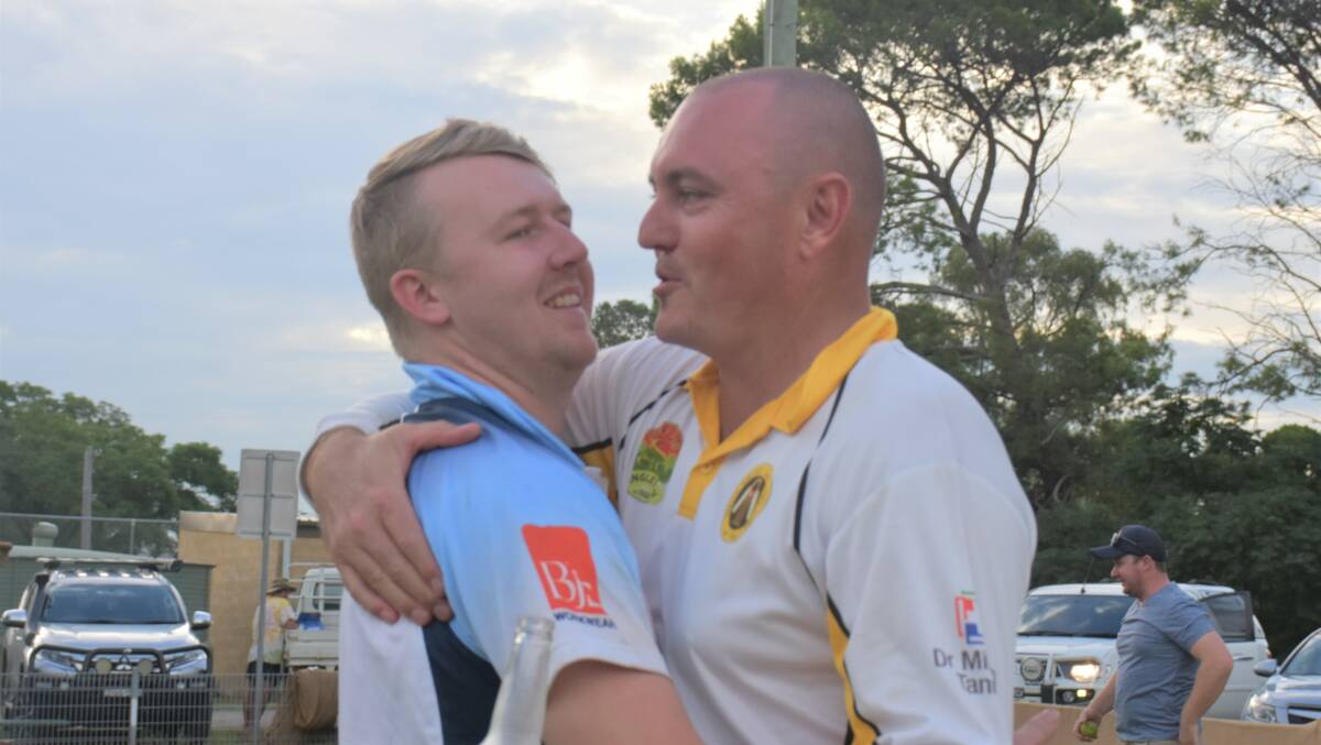ALL SMILES: Jake Mackaway pictured with former teammate Nathan Bagnall moments after the 2018/19 SDCA first grade final.