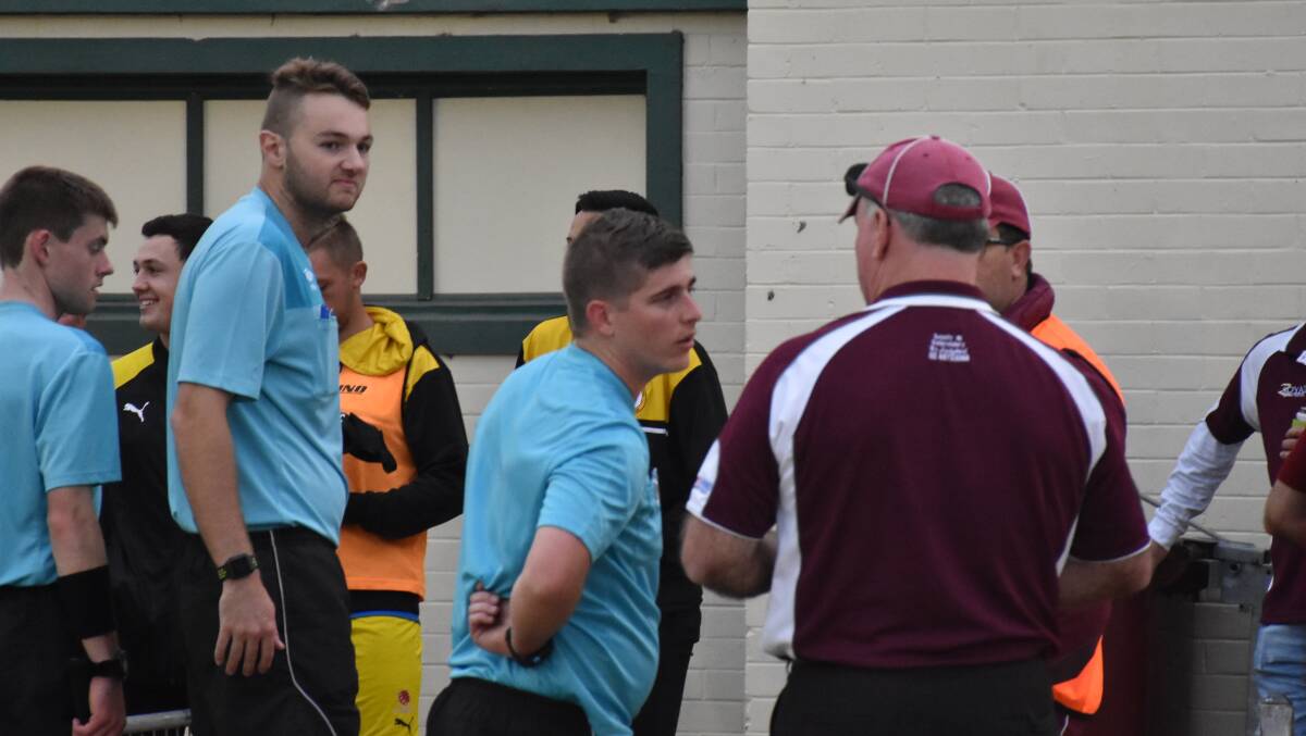 SATURDAY ACTION: Singleton senior coach Dave Willoughby speaks with officials after the match.