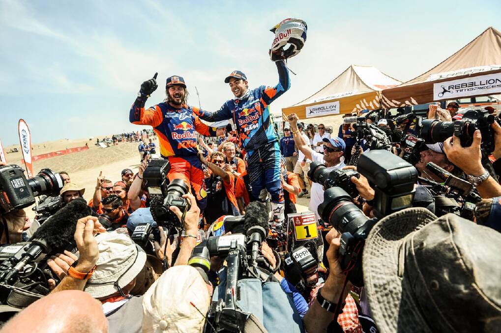 WINNER: Singleton's Toby Price celebrates his second Dakar Rally championship with fellow Red Bull KTM Factory Team rider Matthias Walkner (Austria). Photo supplied by Dakar Rally.
