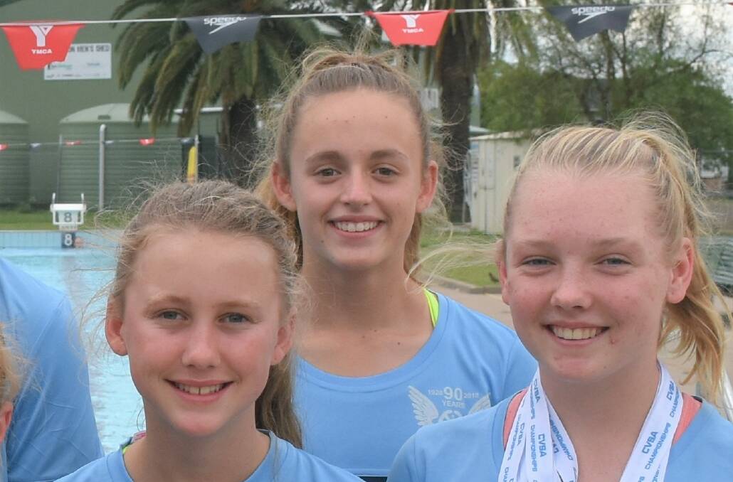 GIRL POWER: Alice Small standing behind her teammates Jessica Flemming and Alix O'Bryan.