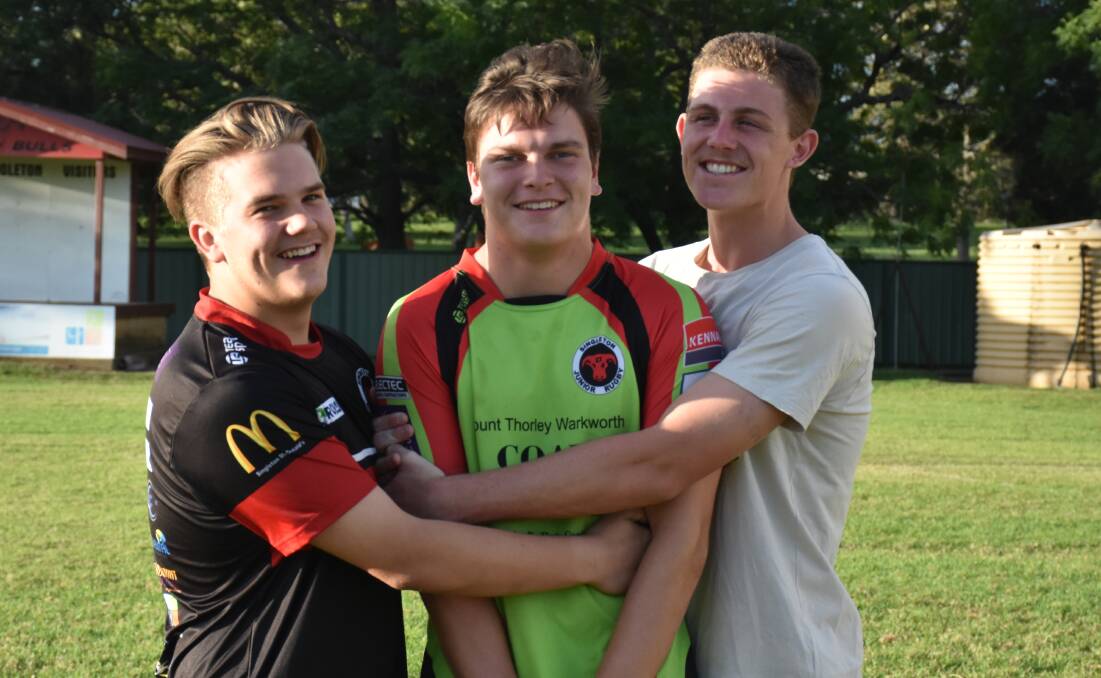 BROMANCE: Jayden Duff receives an affectionate farewell from his teammates on Tuesday evening.