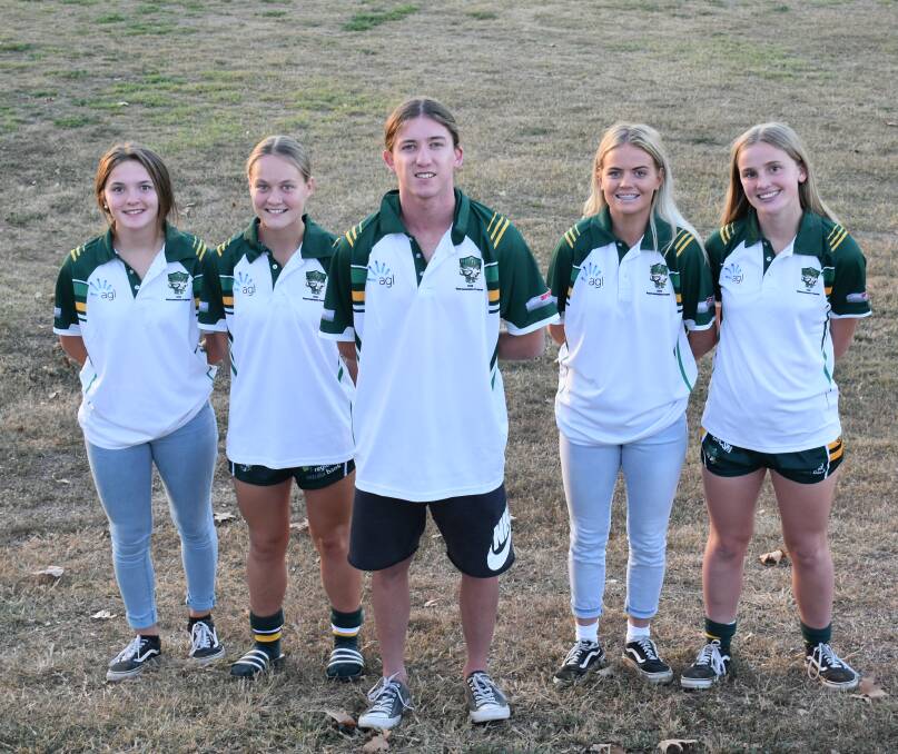 TAKING FLIGHT: Injured junior Cooper Maytom will assist the Hunter Valley Group 21 JRL U16 representative squad in Melbourne this weekend. The teenager is pictured standing before under-16 representatives Ruby Bennett, Jules Kirkpatrick, Caitlin Warren and Sophie Clancy.