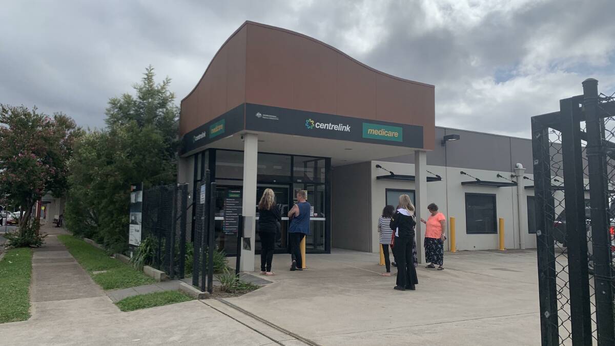 LEFT WAITING: The crowds already started to file towards the Singleton Centrelink this morning.