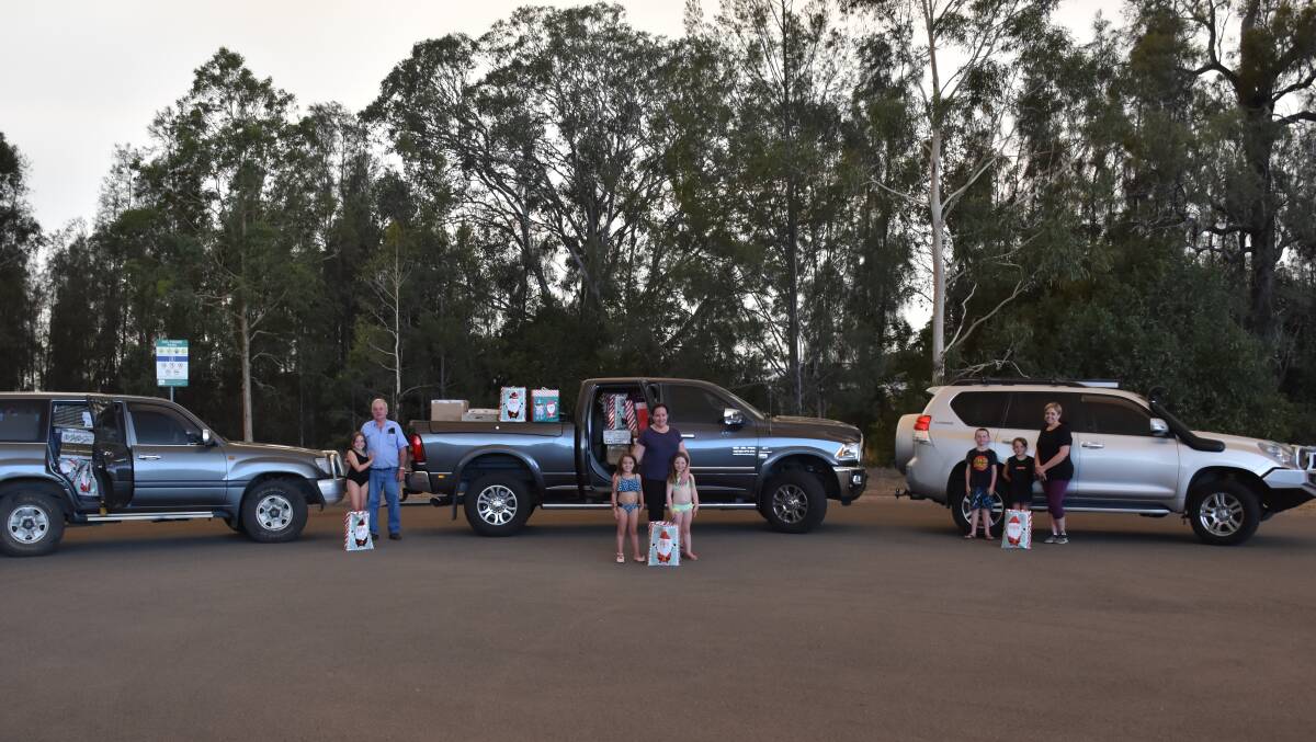 READY TO GO: Three car loads of Christmas packages were transported from Hunterview (near Singleton) on Friday night to the Cobar region on Saturday for families doing it tough.