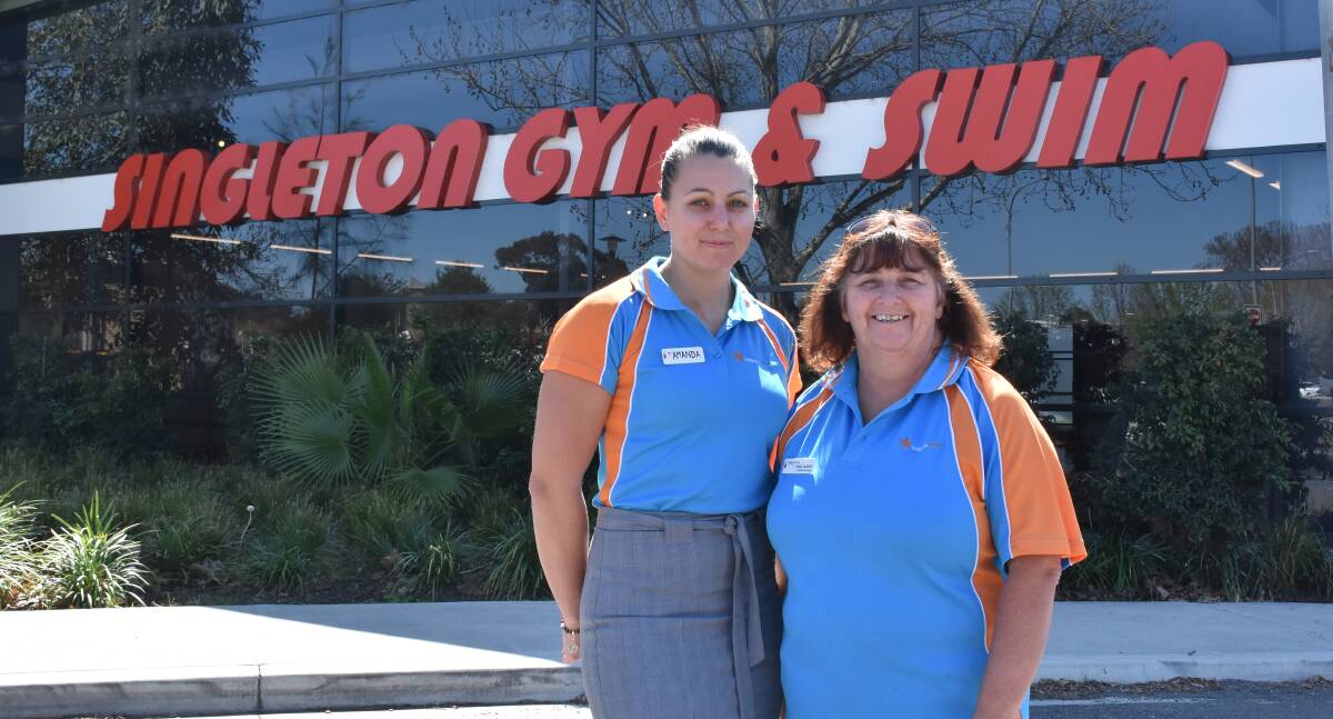 NEW COLOURS: Amanda Lenton (Belgravia Leisure area manager of Singleton) and Kristy Lambkin (assistant manager) have declared the opening ten weeks of Belgravia management a success for the Singleton Gym and Swim.