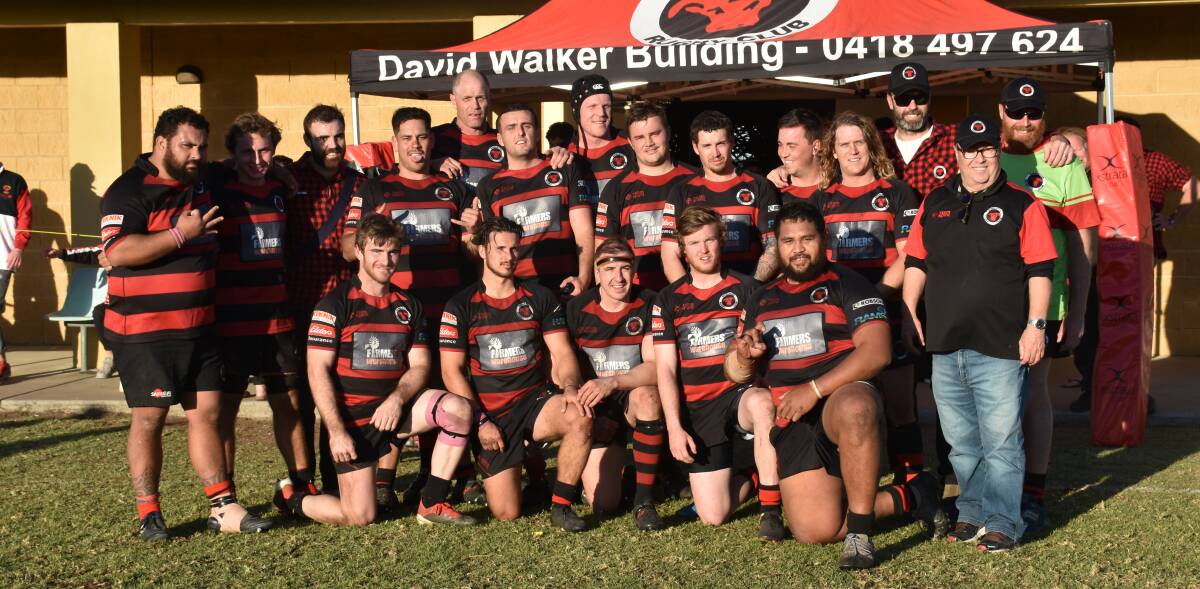 ALL SMILES: The Singleton Bulls' first grade side pictured post-match.