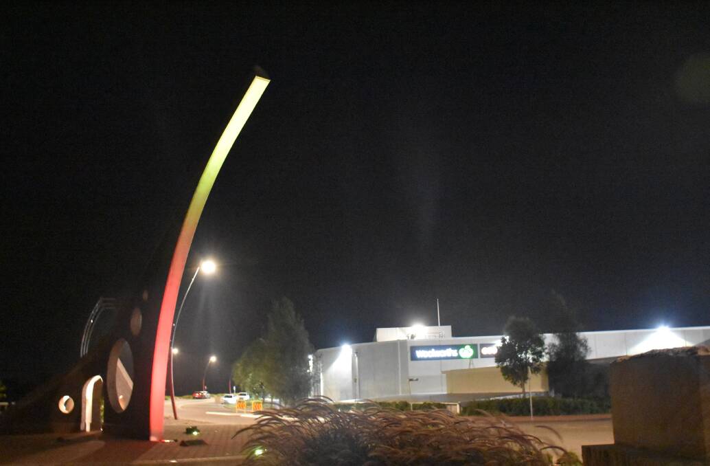YELLOW, GREEN AND RED: The iconic Singleton sundial (largest in the Southern hemisphere) lit up in Lithuanian colours on Monday night.