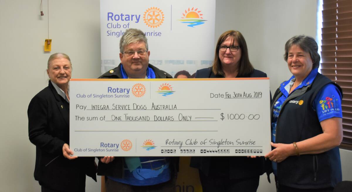 THE DONATION: Karen Stout, Graeme Hooper, Wendy Love and Sue Hooper during the presentation toward the Integra Dog Services Australia initiative on Tuesday morning.