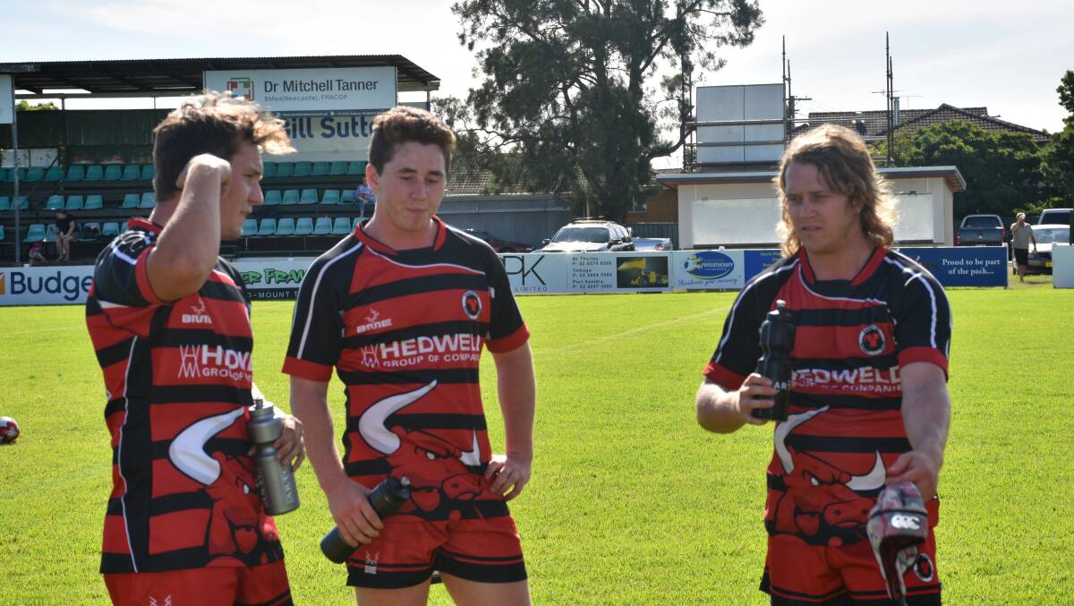 NOT OVER: Singleton Bulls players learn they still have to play in the third place final moments after suffering a 40-0 defeat to Australian Universities.