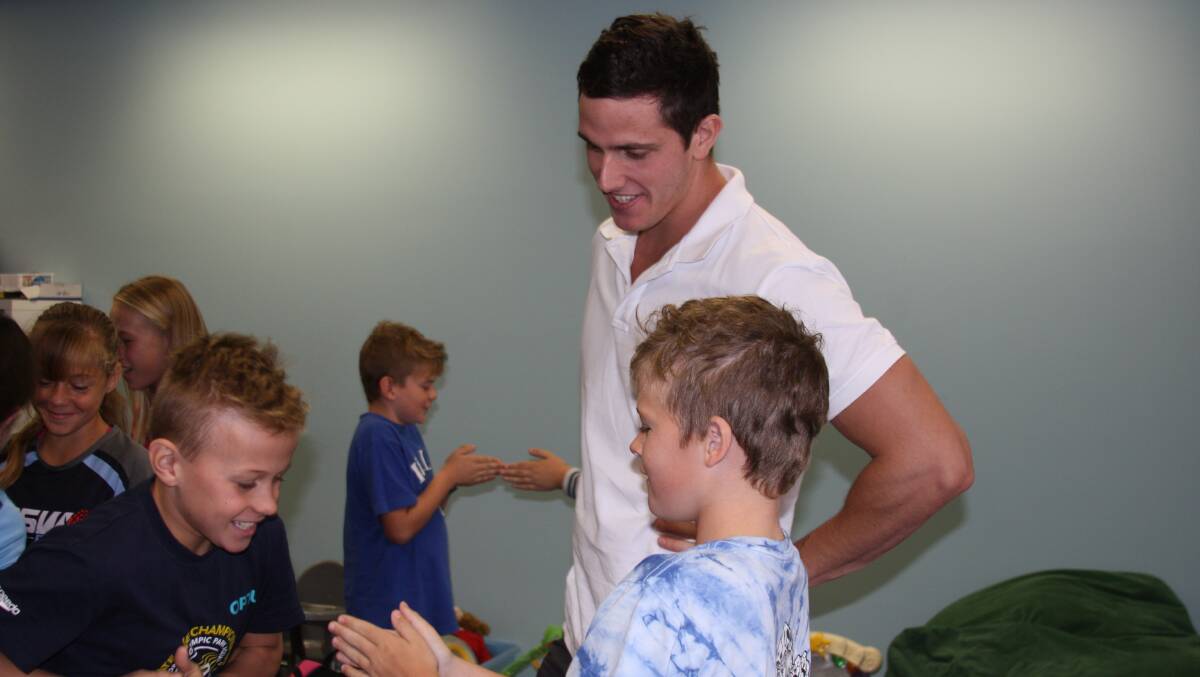 Australian swimming champions James Magnussen and Kurt Herzog joined forces to share their knowledge and skills with local Singleton swimmers on Sunday afternoon.