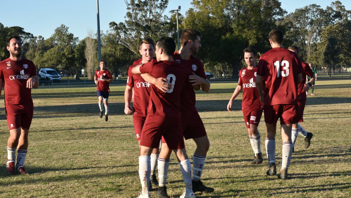 A WIN AT HOME: The Singleton Strikers' senior side bid farewell to Howe Park for season 2019 with a 2-0 win against the Thorton Redbacks. Here Joseph Civello celebrates a goal with Jake Barner and Lachlan Nicol in the second half.
