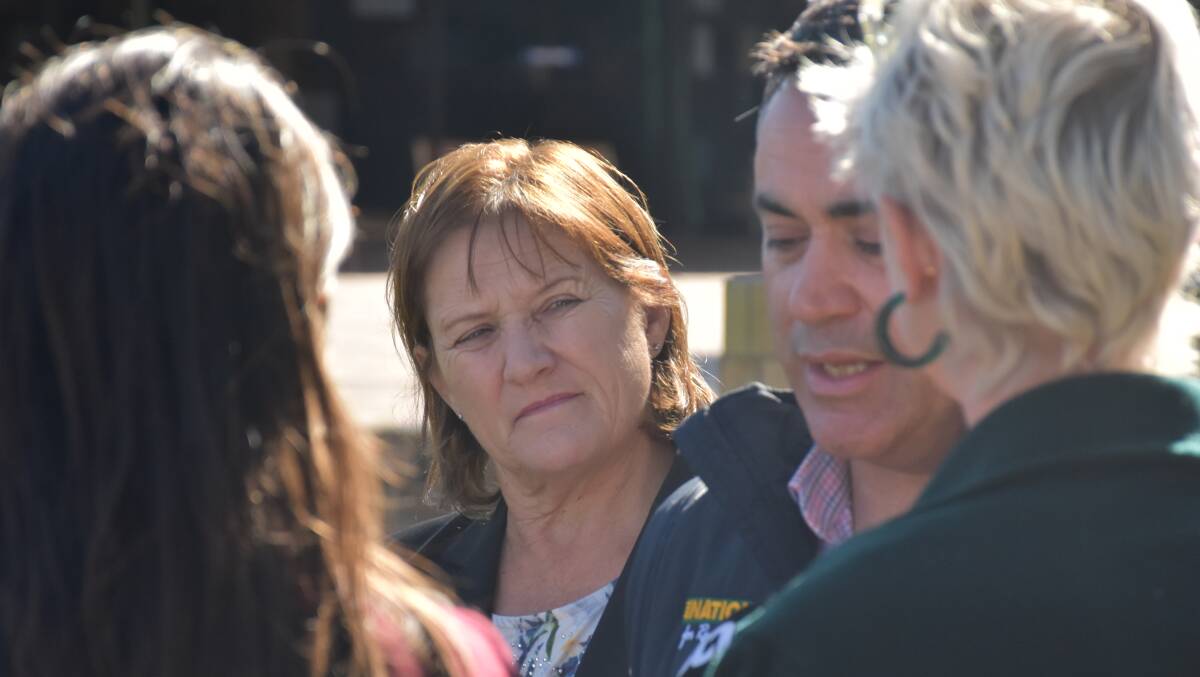 LOCAL LEADER: Singleton mayor Sue Moore listens in on New South Wales Deputy Premier John Barilaro's announcement this morning.