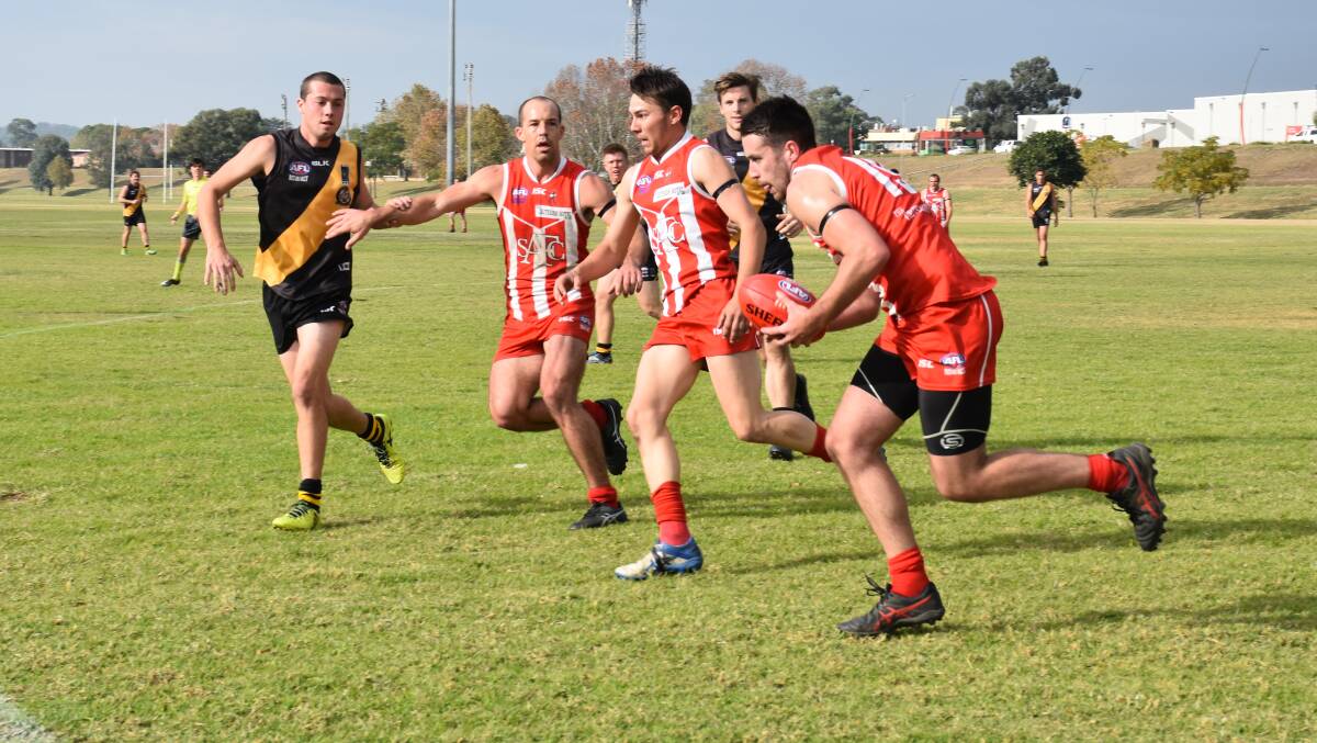 ON THE RUN: Sam Howard pictured in the first term of Singleton's last clash with Gosford in Round 8 this year.