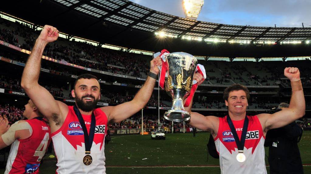 Craig Bird pictured moments after receiveing his 2012 AFL premiership medal (Photo supplied).