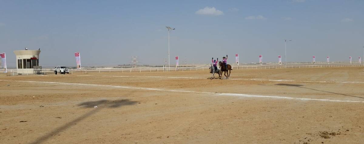 FINISH LINE: The Princess and Debbie Pevy finishing a 120km race in Dubai.