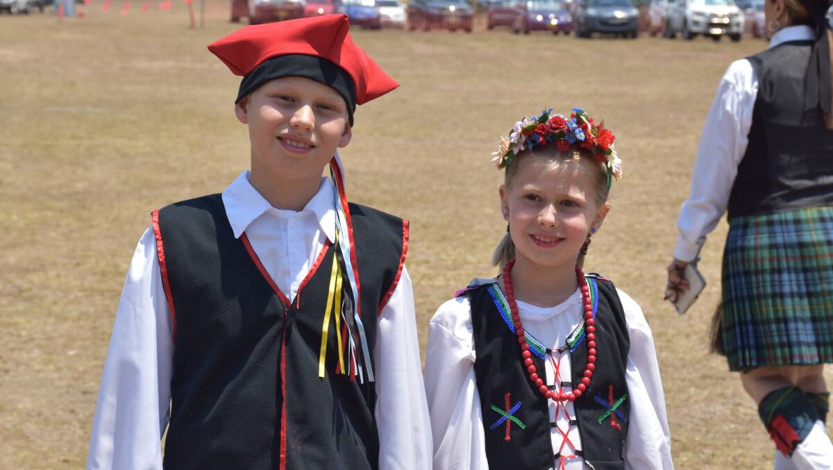 PERFORMANCE READY: Oliver and Chloe De Fraine pictured moments before their performance with the Polish school's dance group.