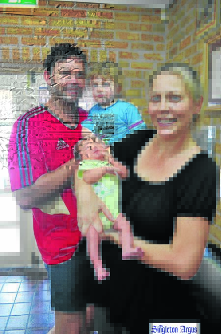 Jason and Jacqueline Fry with baby Ruby and brother Reece.