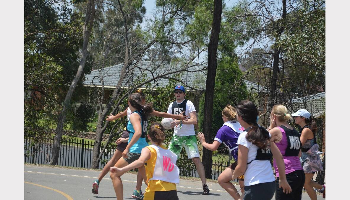 Singleton Heights Public school play the teachers in netball