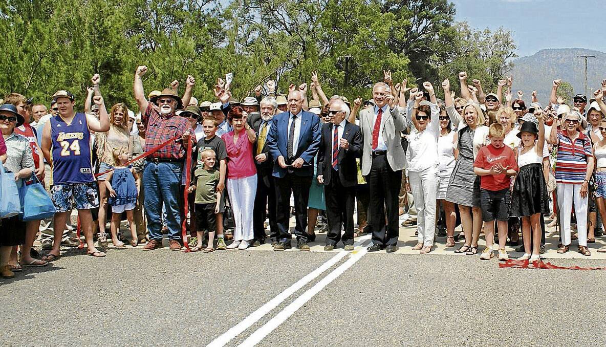Residents celebrate the opening of the new bridge at Broke